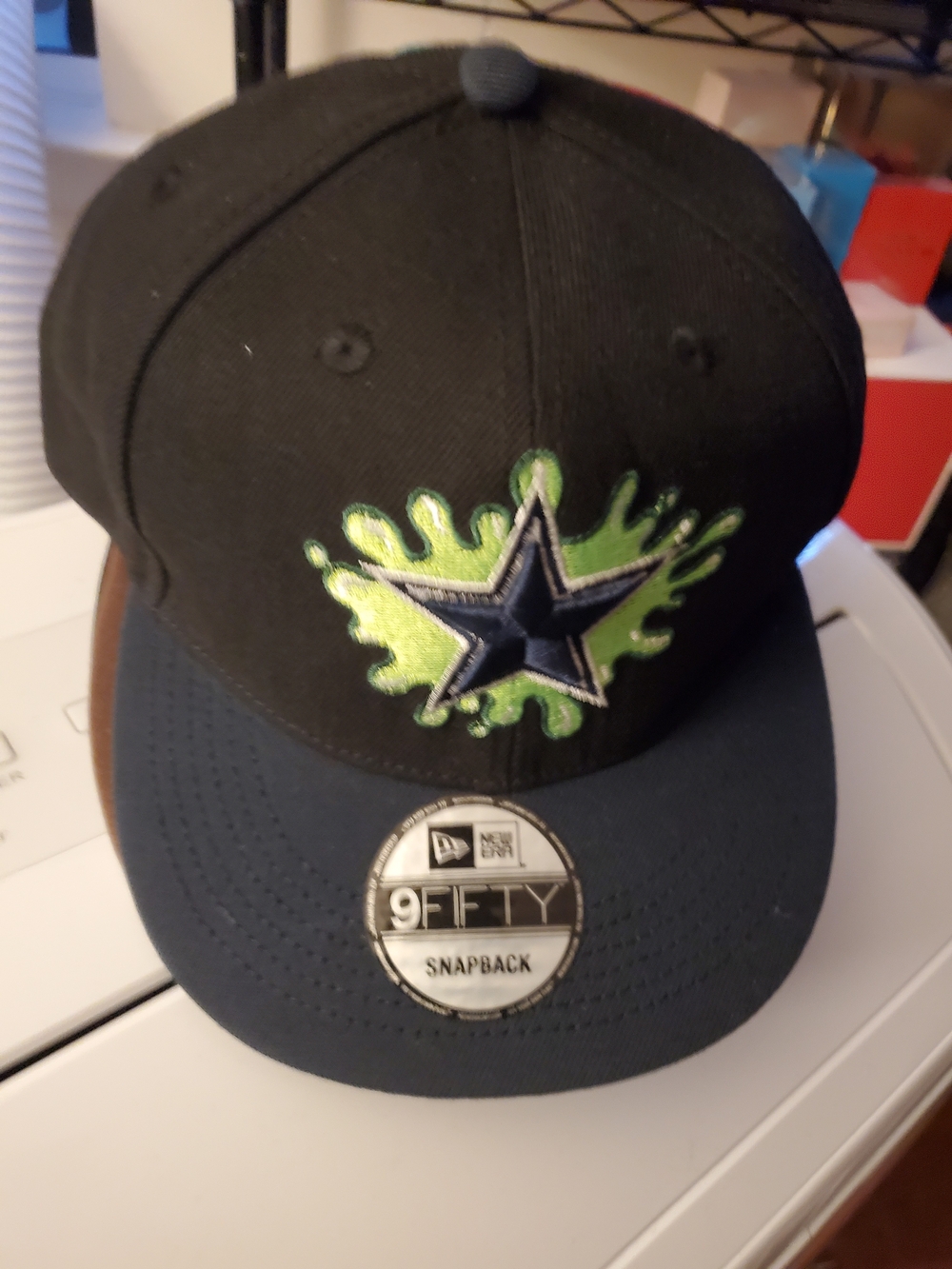 🏈New Era Black & Navy Snapback Cap with Blue STAR & Green Splash Background 🏈